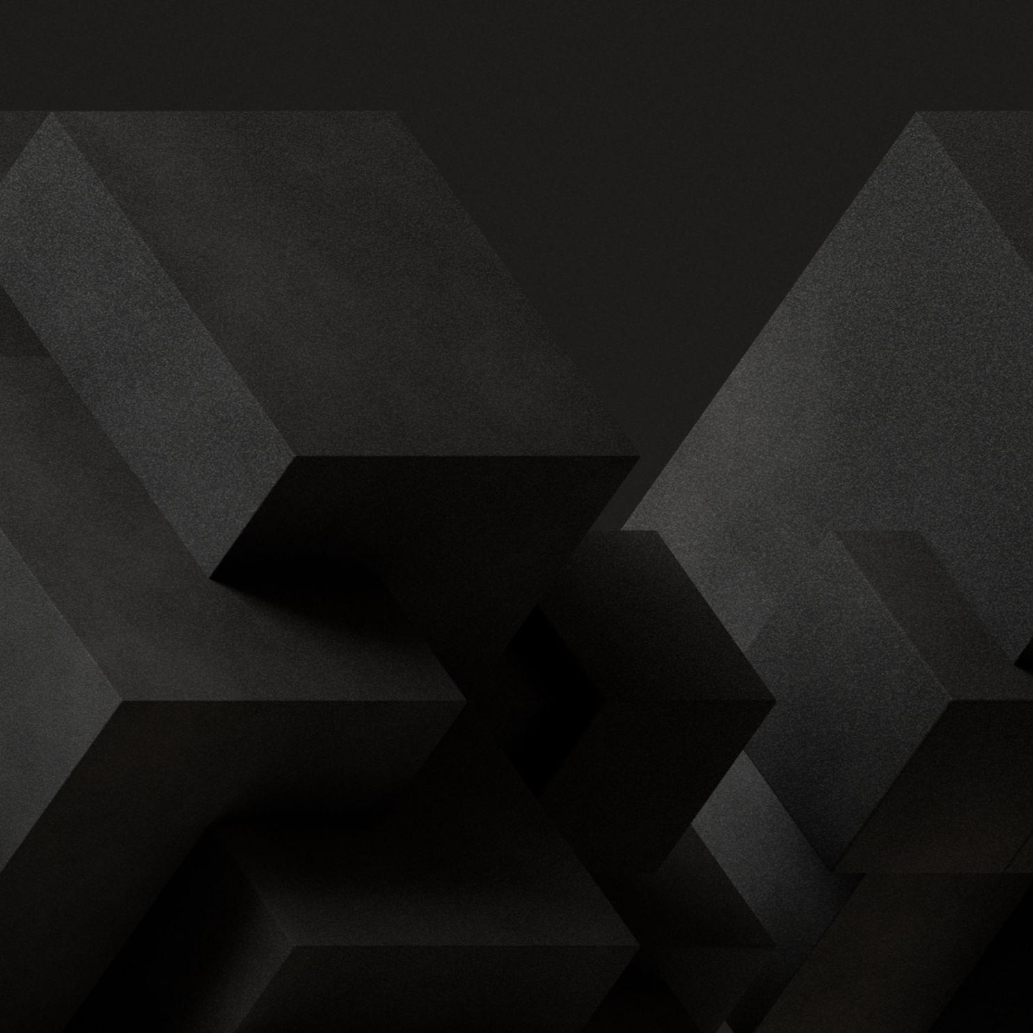 Abstract black and gray cubes on a dark background