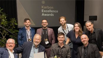 2025 Karbon Excellence Awards winners at a table at the Karbon Next 2025 event.